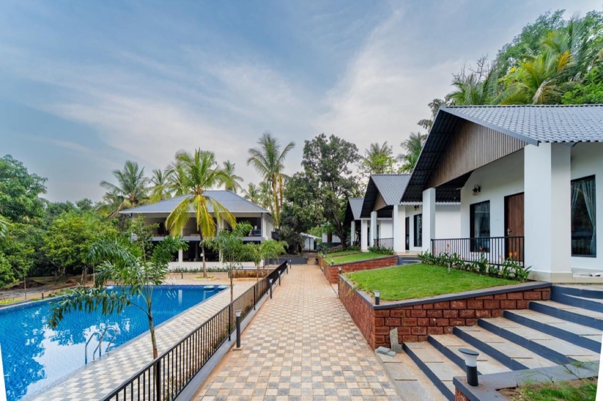 Premium pool view cottage at Vanatara Inn
