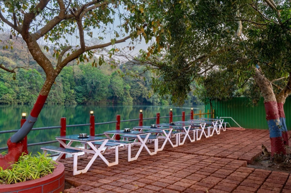 Riverside dining tables on the banks of the Kali river